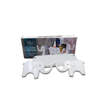 Creative elephant wall shelf securely mounted on a white wall.