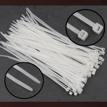 Black 10-inch cable ties from Organivo, shown coiled and ready for diverse applications.