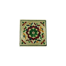A child comfortably sitting on a low wooden chowki, demonstrating its multipurpose use as a small stool.