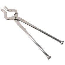Full round stainless steel cooking tool pincer securely gripping hot pots