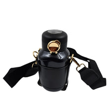 Tumblo Smart Thermos Bottle being used outdoors, ideal for travel and hiking.