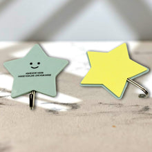 Packaging showing a pack of GlimmerHome self-adhesive hooks, highlighting their easy installation.