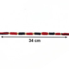 Detailed view of traditional Rakhi with bead work