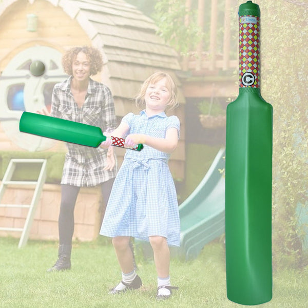 Kids playing cricket with a plastic bat and ball set on a sunny day