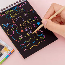 Multiple rainbow art scratch books stacked, emphasizing the pack of 10 pages.