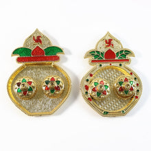 Side view of vibrant Kalash-shaped plastic kumkum box for pooja rituals