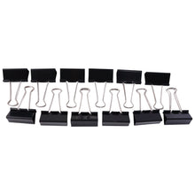 Multiple black binder clips for organizing files
