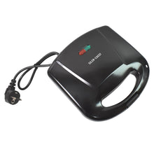 Top-down view of the non-stick Dabster sandwich maker ready for use.