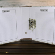 Multiple Lever Arch File Organizers stacked neatly on a shelf.