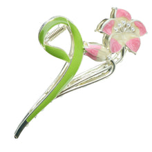 Close-up of floral and leaf design on hair claw clip