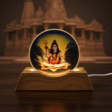 Soft warm glow of Lord Shiva LED night light illuminating bedroom corner