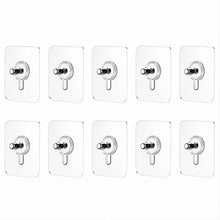 Kitchen utensil hanging on adhesive wall hook