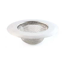 Stainless steel kitchen sink strainer filtering food particles and hair