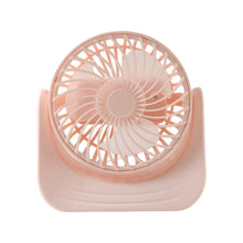 User enjoying cooling from silent mini desktop fan at workspace