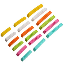 Various food items like bread and snacks kept fresh with plastic food clips.