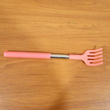 Khujli Stick back scratcher with its product packaging and included accessories.