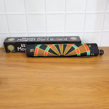 Closed roll-up dartboard in travel tube with included safety darts