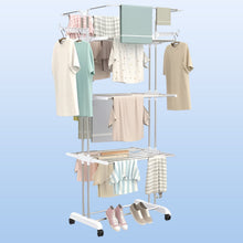 Compact foldable clothes drying rack shown partially folded for storage.