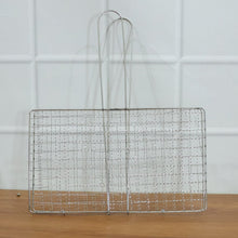 Heavy-duty stainless steel grill basket suitable for camping and picnics