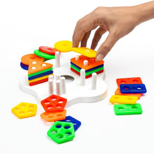 Close-up of colorful geometric shape pieces for toddler educational sorting
