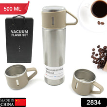 Stainless steel vacuum flask set 500ml being used outdoors with hot coffee
