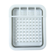 Plastic dish rack organizing plates and utensils