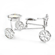 Decorative cycle tealight stand with candle enhancing living space ambiance