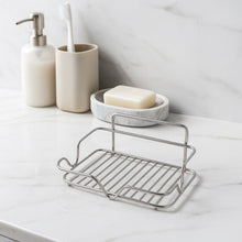 Close-up view of polished stainless steel soap holder with rust-resistant finish