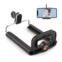 Universal mobile holder attachment ready for use with various phones and tripods.