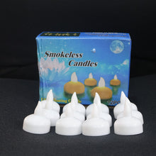 Eco-friendly smokeless LED floating lotus candles glowing warmly in glass vase