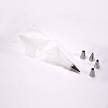 A collection of stainless steel piping nozzles for intricate cake and cupcake decorations.