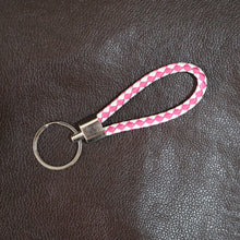 Stylish braided leather style keychain accessory with durable metal ring