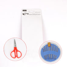 A white background with a blank sewing kit package, featuring circular insets of red scissors and a blue needle case.