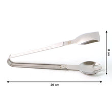 Salad being served with stainless steel multipurpose serving tong