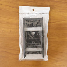 Mini chair shape phone holder ideal for hands-free mobile use