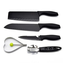 Ergonomic handles on the chef and utility knives from the professional kitchen knife set.