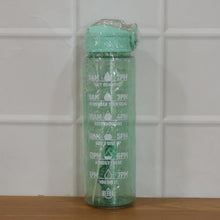 Water bottle displayed with gym and outdoor gear for active lifestyle