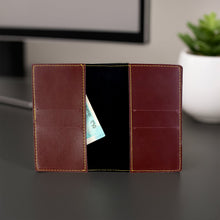 PU leather card holder fitting comfortably in pocket for portability