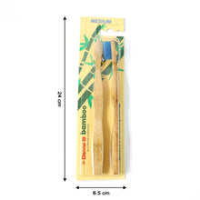 A twin pack of bamboo toothbrushes with blue and beige bristles, showing dimensions of 24 cm and 6.5 cm.