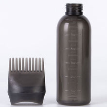 Comb applicator bottle used as a hairdressing and styling tool for various products.
