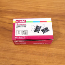 Black binder clips used to organize paperwork neatly