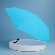 A selection of DrizzlePro 3-fold umbrellas showcasing various cute and vibrant patterns suitable for kids and adults.