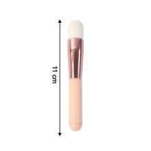 Ergonomic handle of soft makeup brush offering comfortable grip for face blending