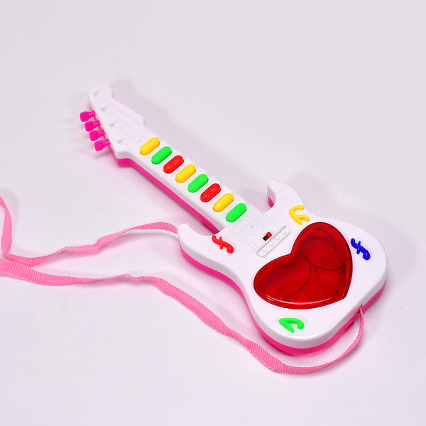 A cheerful child playing with a light-up musical toy guitar for kids.