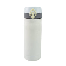 A child's hand holding the FitFuzion Kids Insulated Water Bottle, demonstrating its comfortable grip.