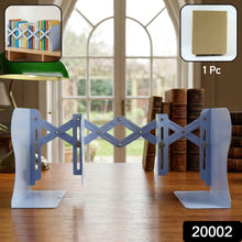 Close-up of the adjustable scissor design on the expandable book stand
