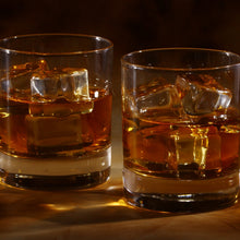 Decorative glass holder for cafes, enhancing beverage presentation.