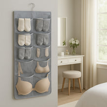 Empty hanging under garment organizer showing multiple pocket layout