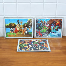 Stack of assorted educational wooden jigsaw puzzle boards for kids