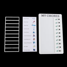 Child using the chore note board to track their daily responsibilities.